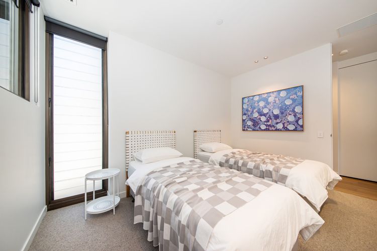 Bedroom with 2 long single beds