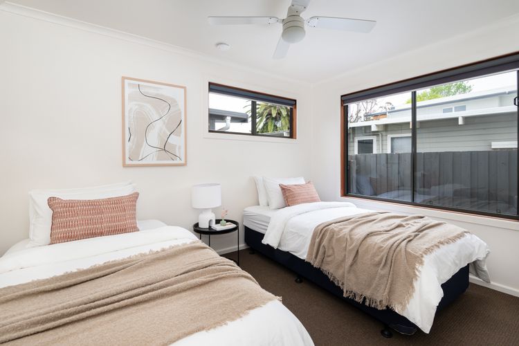 Bedroom two in back house with single beds 