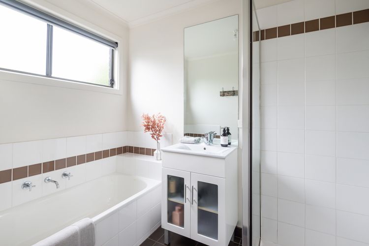 Bathroom in back house with bath 