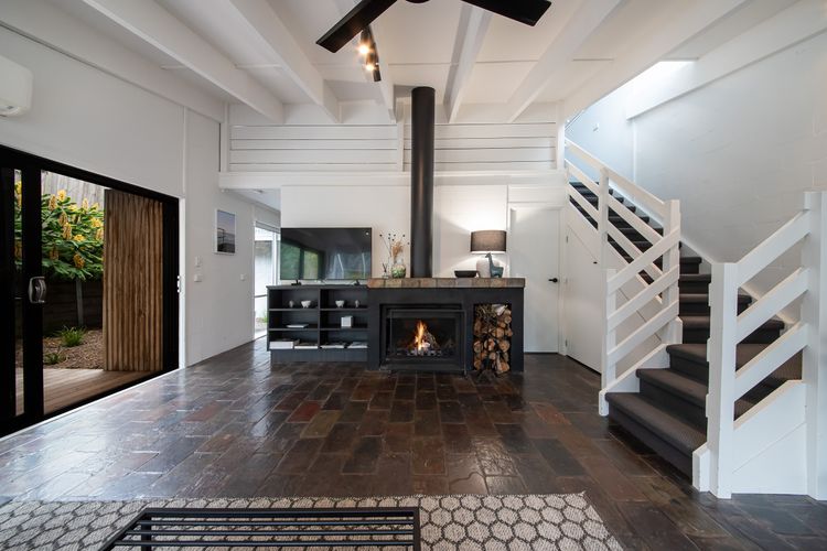 Enjoy the cozy warmth of our indoor fireplace.