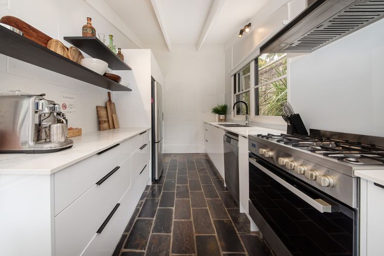 Every detail of the kitchen is designed with both style and functionality in mind. 
