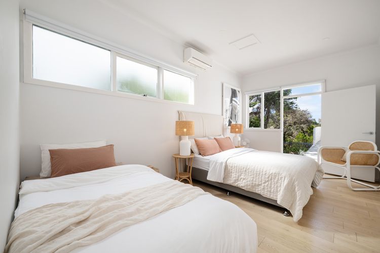 Bedroom Twelve with Queen bed and king single bed sleeping 3