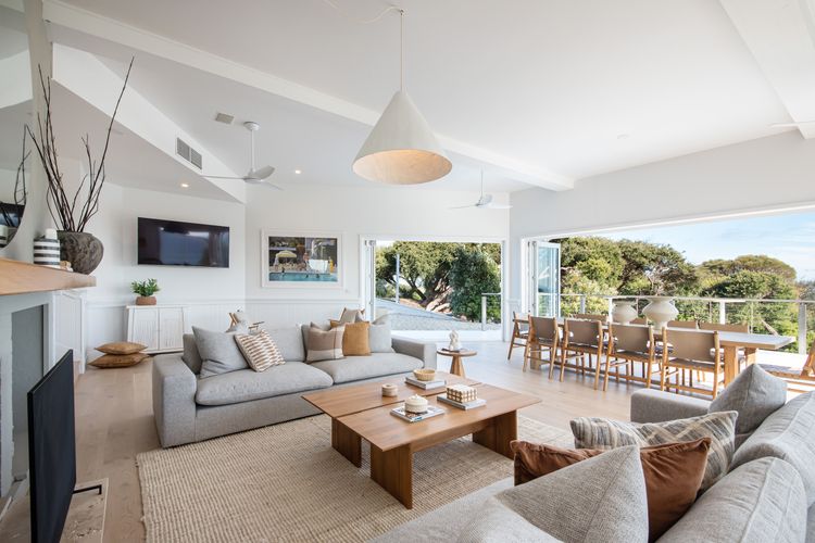 Main living with fireplace and air conditioning.  Doors open out onto balcony 