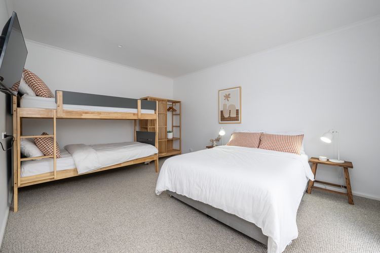 Bedroom eleven with queen bed and king single bunk, sleeping 4