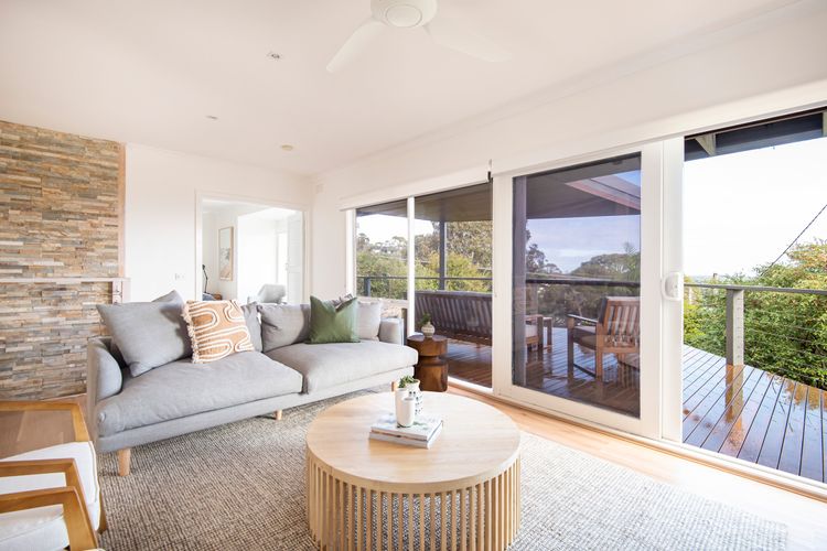 Upstairs living leading out to balcony