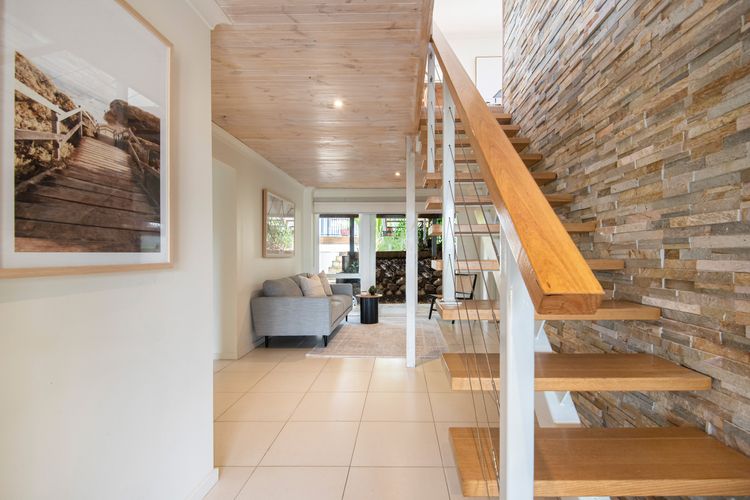 Downstairs living and stairs leading to main living