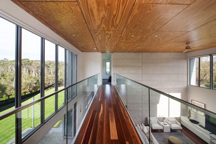 Impressive mezzanine walkway to master bedroom 