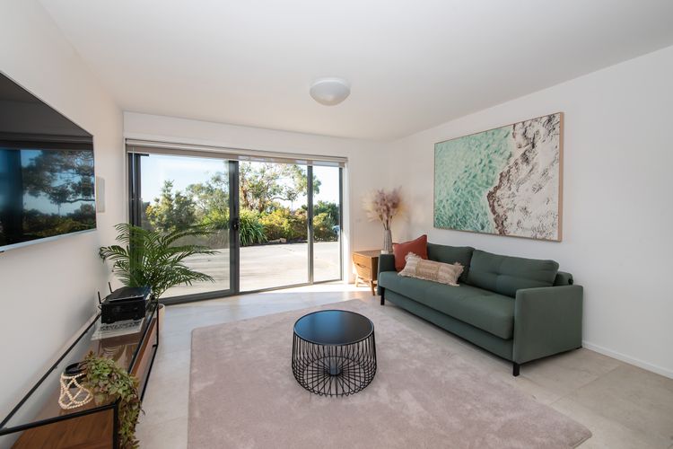 Welcome to our inviting downstairs living room.