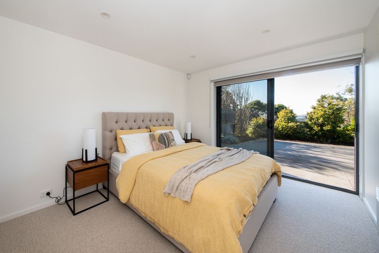The bed serves as the centre of the room, inviting you to sink into its embrace and enjoy a restful night's sleep.
