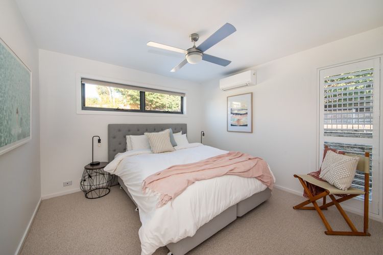 This is a Queen bedroom at the end of the house on the left the Queen bed can be split into two single beds.