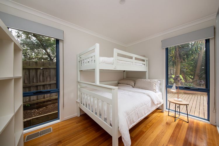 Bunk room with tri bunk bed