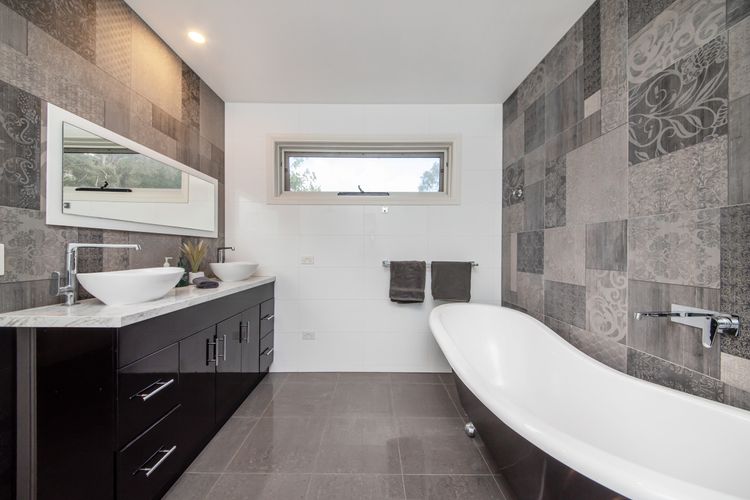 Main bathroom with bath and shower 