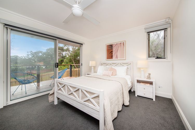 Master with balcony access, ensuite and queen bed, dedicated desk space and TV 