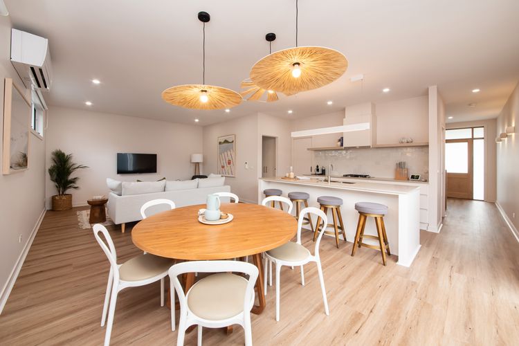 Light filled living rooms and a dining space