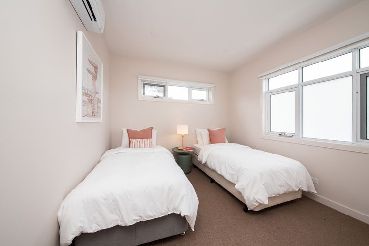 Welcome to our cozy bedroom three, featuring two comfortable single beds