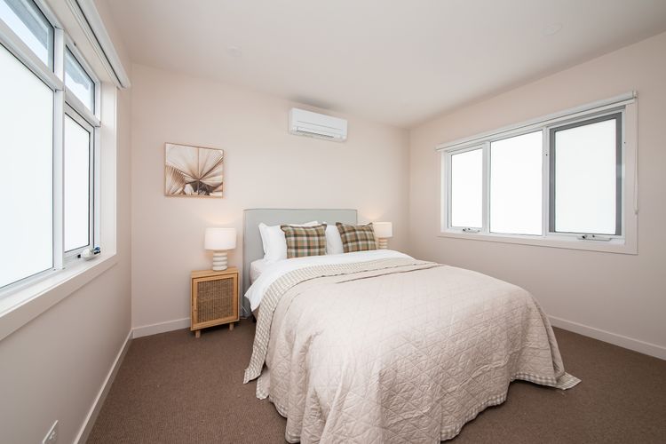 Welcome to our elegant bedroom two, featuring our sumptuous queen-sized bed