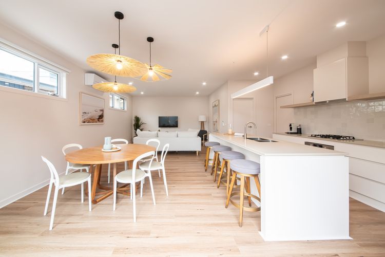 Step into our inviting dining area and kitchen, where culinary delights and shared meals come together in a space designed for both comfort and functionality