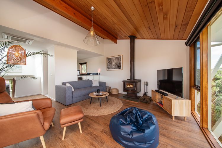 Wood fireplace and smart tv in the living room 