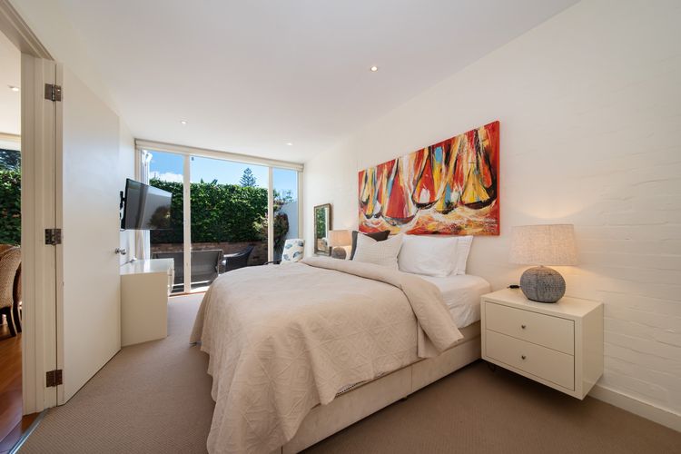 Master bedroom featuring a king-size bed