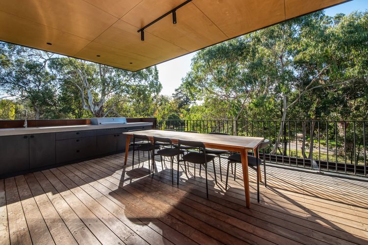 OUtdoor kitchen and dining area with views