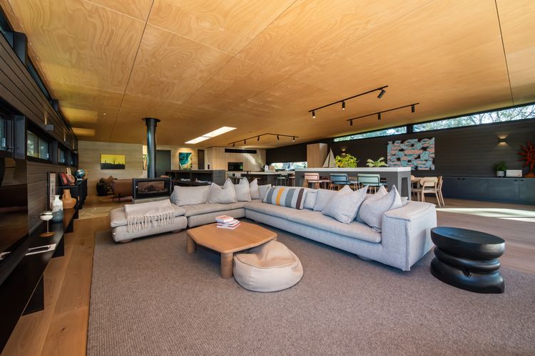 Light and bright living spaces with wood fireplacve, balcony access with BBQ
