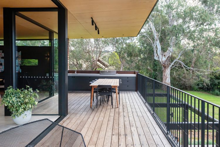 BBQ and outdoor seating area
