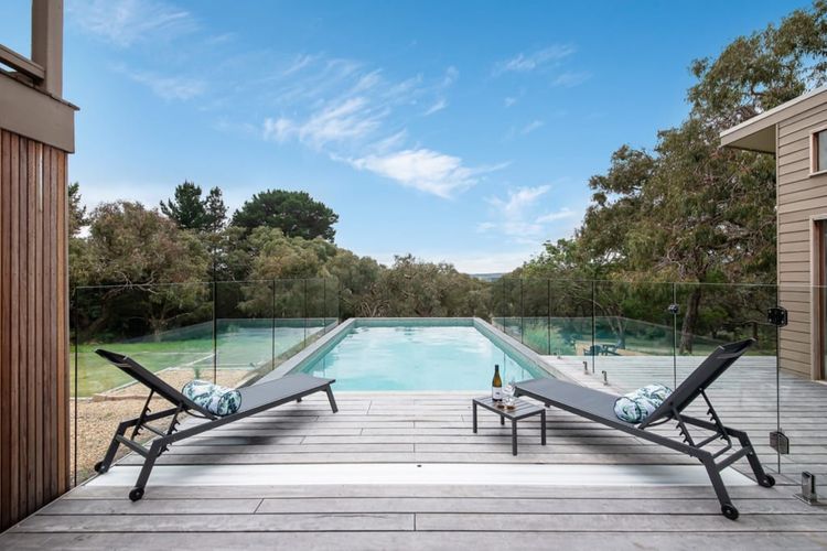 Gas heated pool looking out to the trees