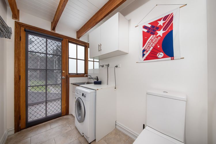 Laundry with washing machine & toilet