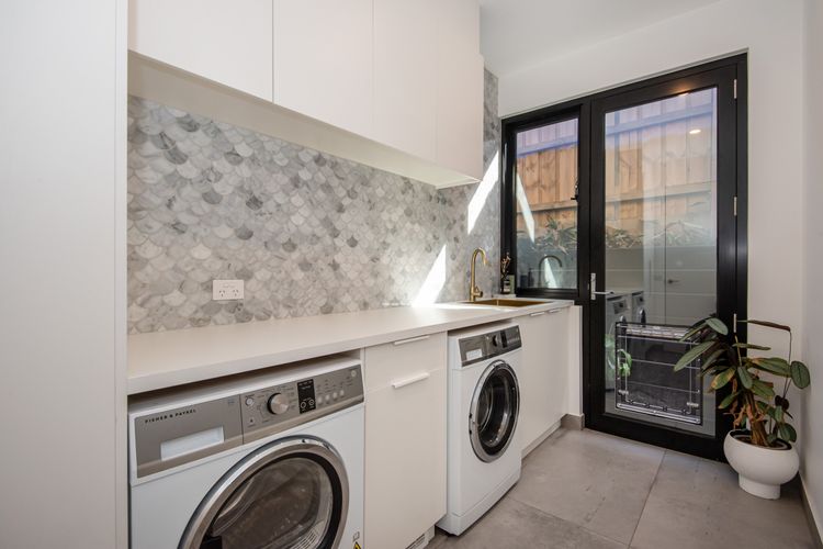 Laundry with doggie door 
