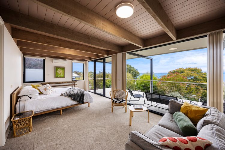Spacious bedroom with bay views