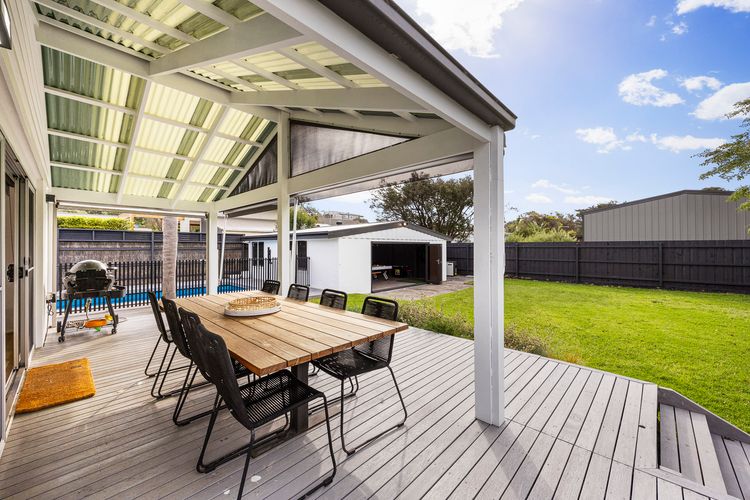 Backyard/deck where you can enjoy BBQ and dinners 