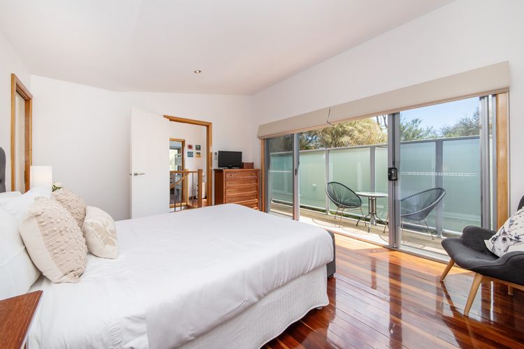 light filled master out to balcony