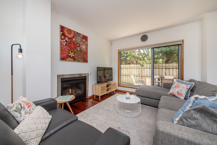 cosy lounge area with gas fireplace