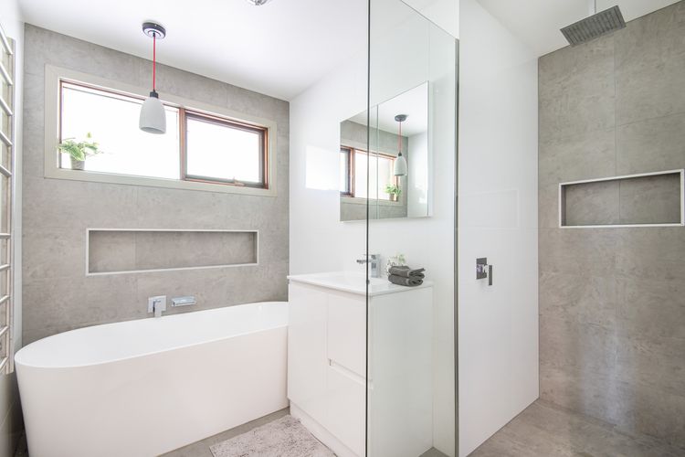 Main bathroom with bath and shower