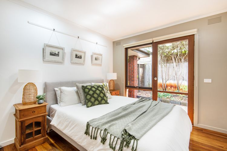 Bedroom three with queen bed