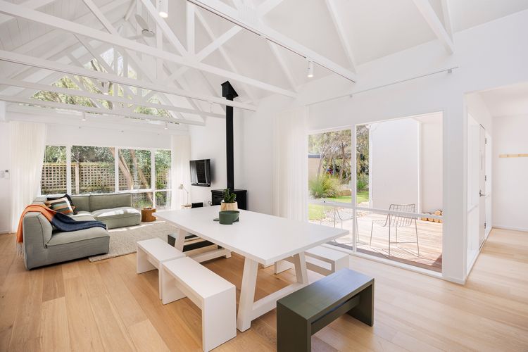 Dining area and living area with the smart TV and fireplace