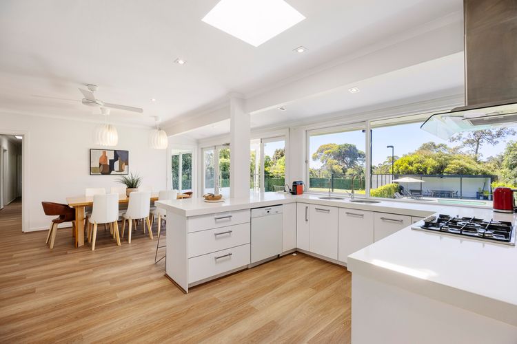 Spacious kitchen with adjacent dining area