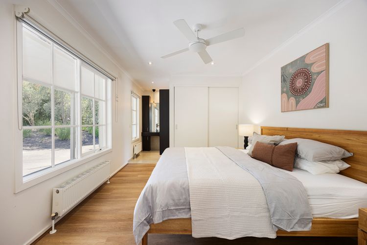 Bedroom one with queen bed and ensuite