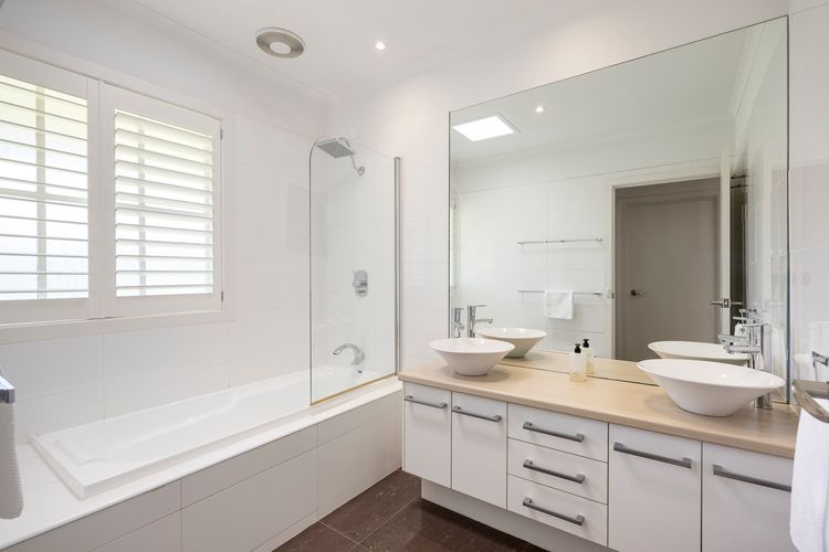 Family bathroom with bath and shower