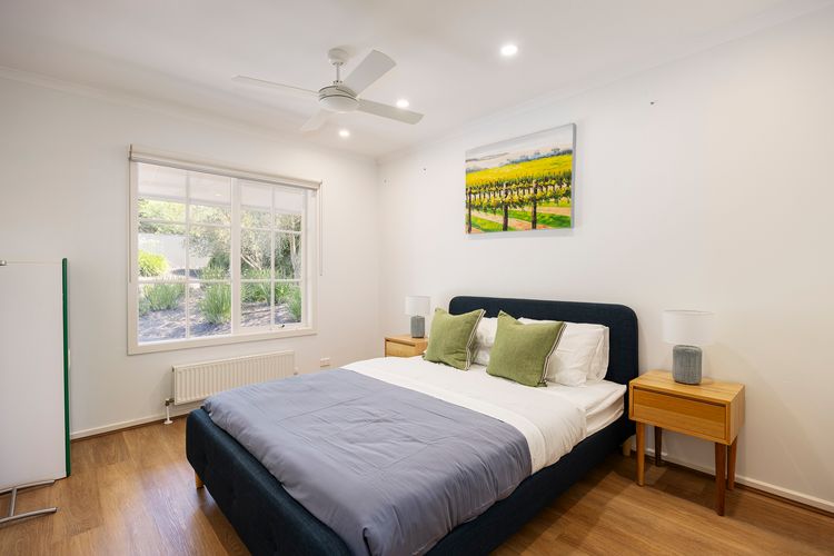 Bedroom three with queen bed