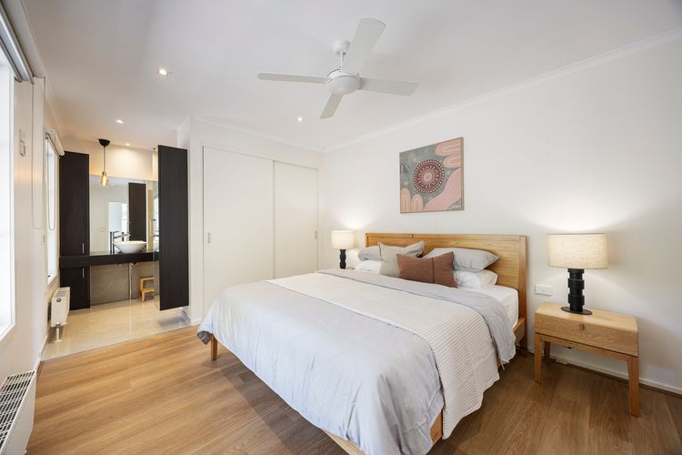 Bedroom one with queen bed and ensuite
