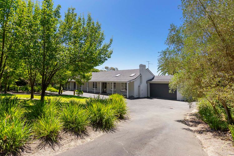 Secure yard with large driveway