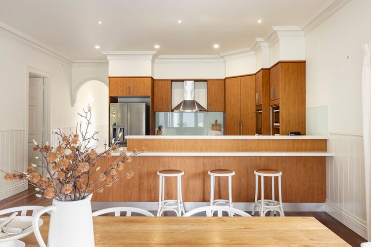 Well-equipped kitchen adjacent to dining area 