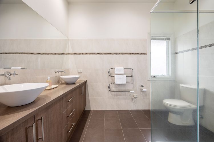 Ensuite bathroom with shower and toilet 