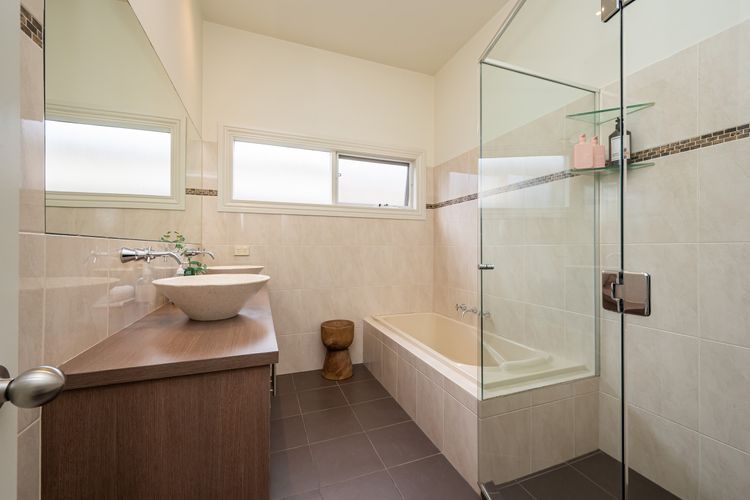 Family bathroom with bath and shower