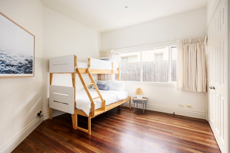 Bunk bed, double bed at the bottom and single bed on top bunk. Perfect for children. 