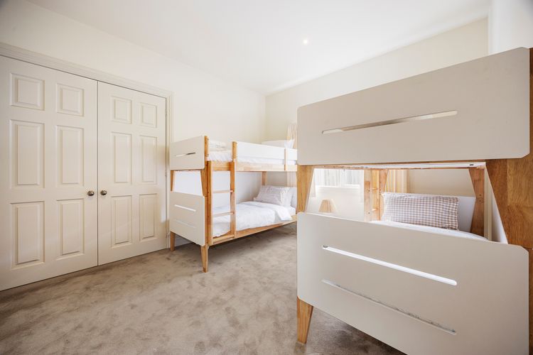 Two single bunk beds, perfect for children
