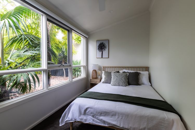 Bedroom three with queen bed