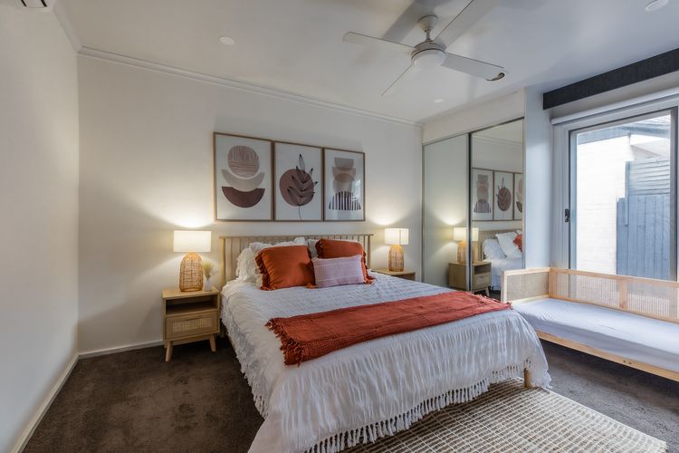 Master bedroom with queen bed and single day bed