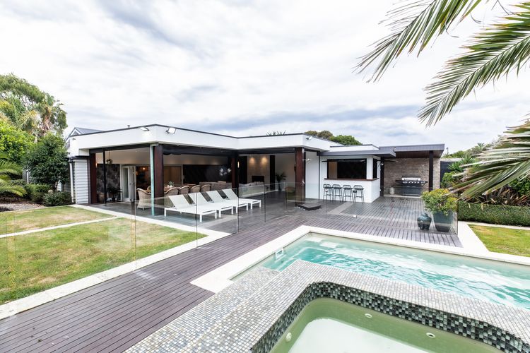 Spa and pool with outdoor seating